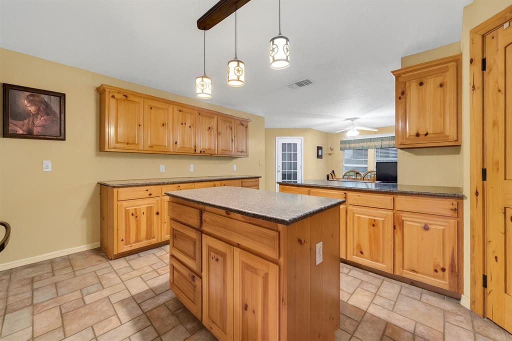 839 Walker Creek Road Ennis, TX 75119 - Photo 4 of 40 Spacious Kitchen. AI edited.