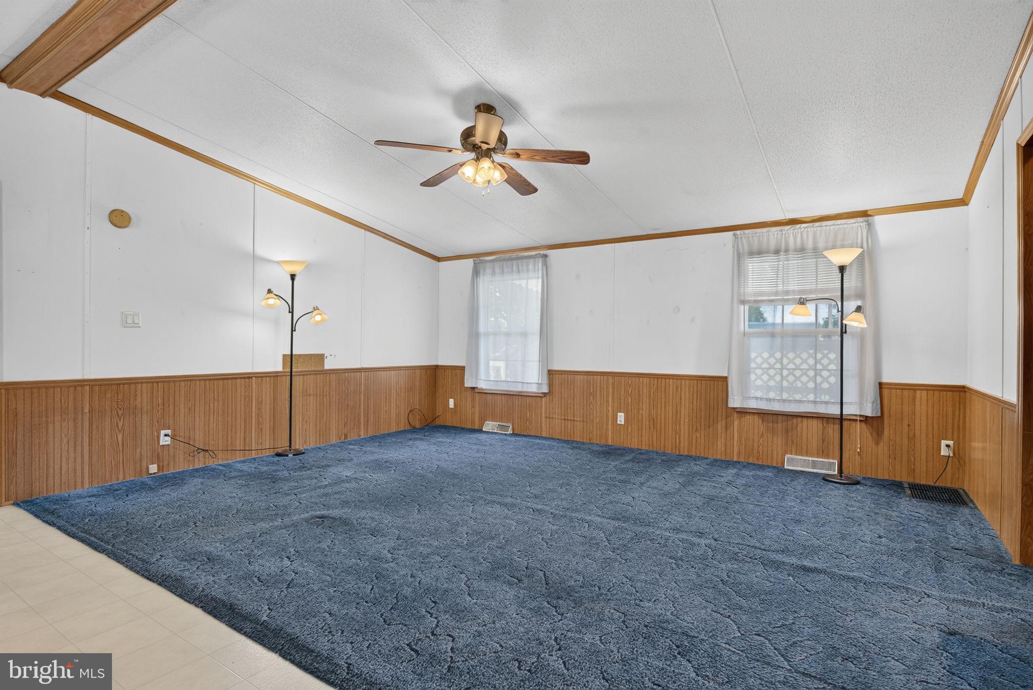 1910 Schubert Road, Unit 8 Bethel, PA 19507 - Photo 14 of 40 Family room highlighted w/breezy ceiling fan
