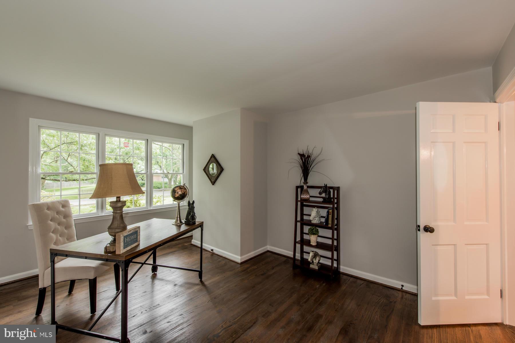 9105 Waycross Road Ellicott City, MD 21042 - Photo 12 of 27 a workspace with wooden floor and a window