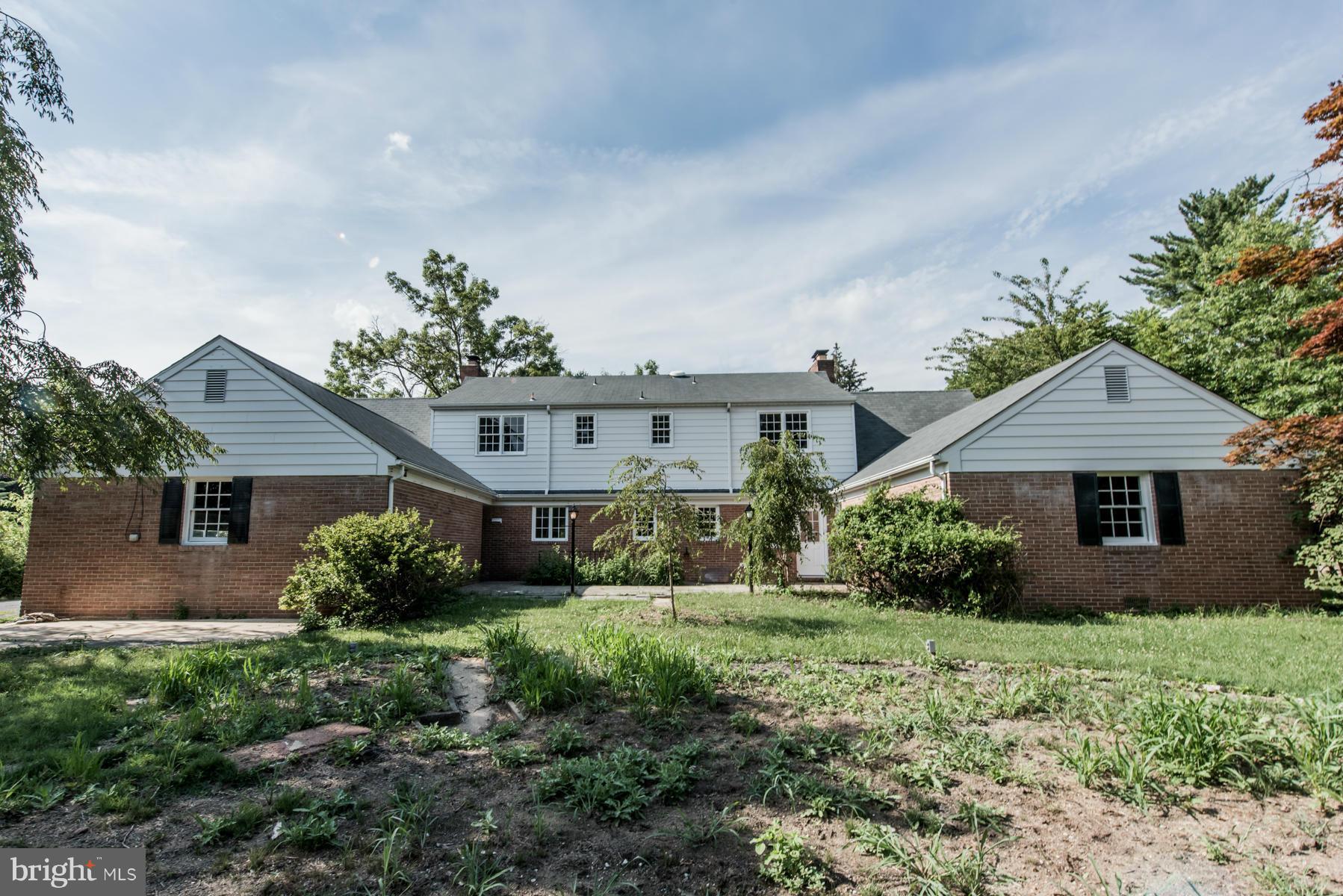 9105 Waycross Road Ellicott City, MD 21042 - Photo 27 of 27 front view of a house with a yard