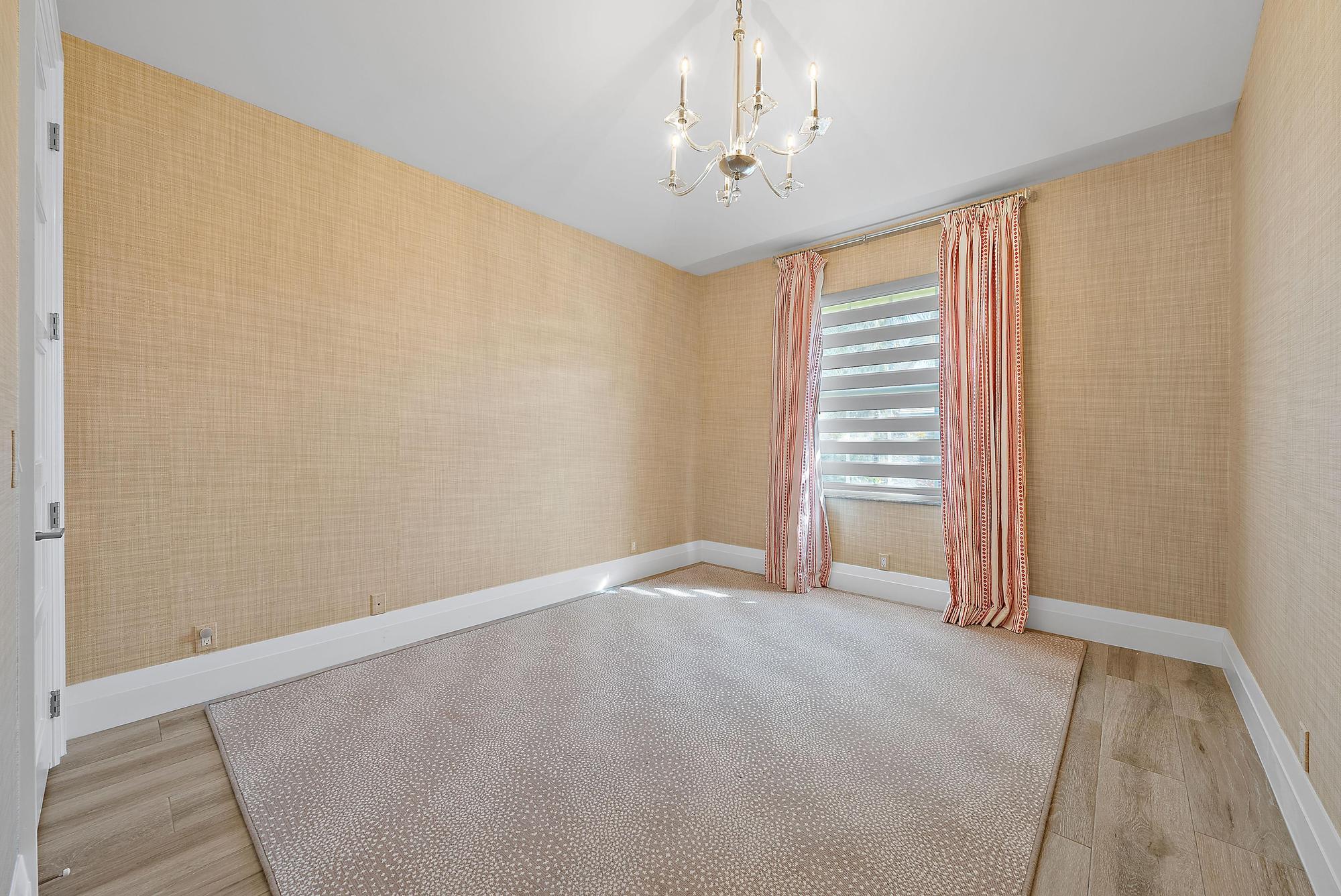 189 Shelter Lane Jupiter Inlet Colony, FL 33469 - Photo 26 of 48 a view of an empty room with a window