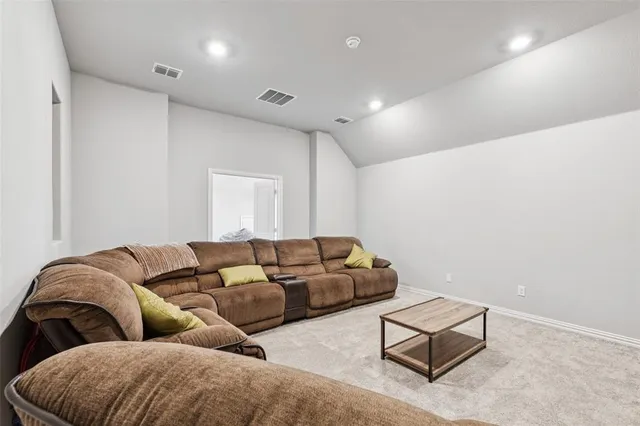 a bedroom with furniture and a bed