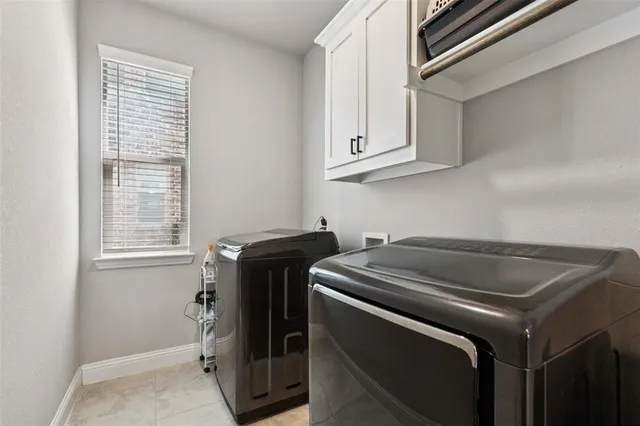 a view of a backyard with a trampoline