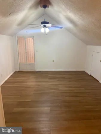 a view of a livingroom with furniture