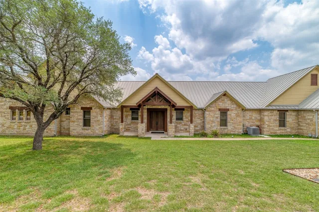 $1,179,000 | 409 Venture Boulevard South, Point Venture, TX 78645