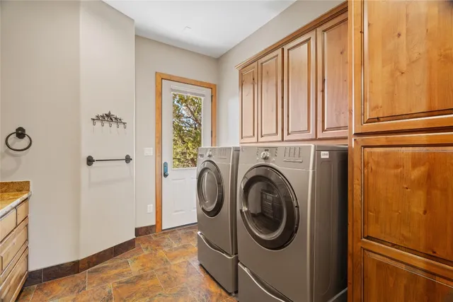 $950,000 | 409 Venture Boulevard South, Point Venture, TX 78645