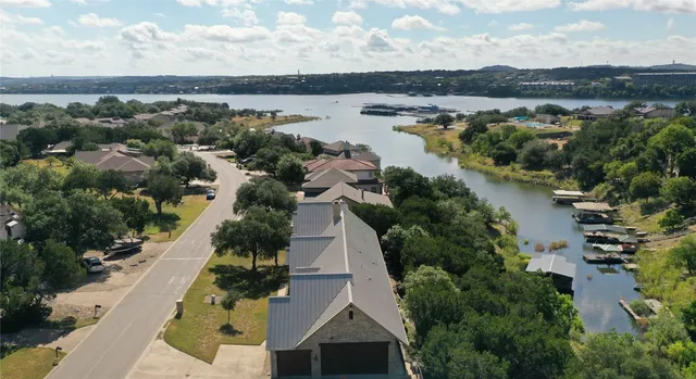 $950,000 | 409 Venture Boulevard South, Point Venture, TX 78645