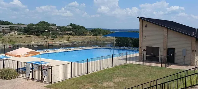 $950,000 | 409 Venture Boulevard South, Point Venture, TX 78645