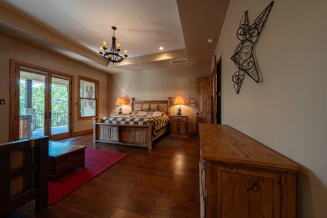 $1,179,000 | 409 Venture Boulevard South, Point Venture, TX 78645