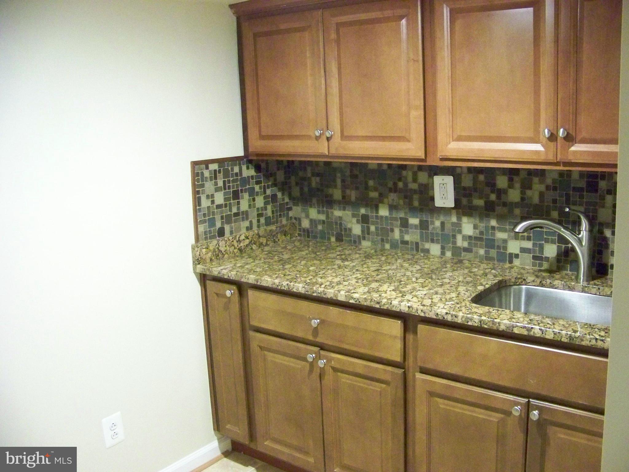 6016 Cipriano Road Lanham, MD 20706 - Photo 23 of 23 Basement Kitchenette / Wet Bar