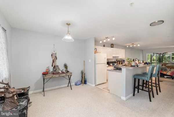 a kitchen with a sink cabinets and appliances