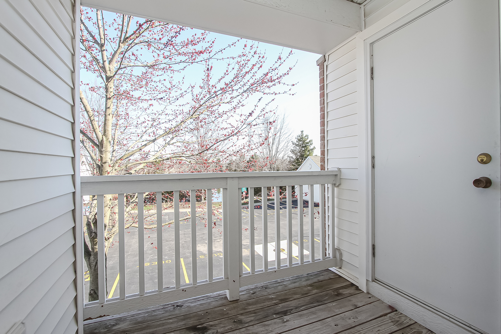 1640 McClure Road, Unit 1640 Aurora, IL 60505 - Photo 13 of 25 a view of wooden balcony