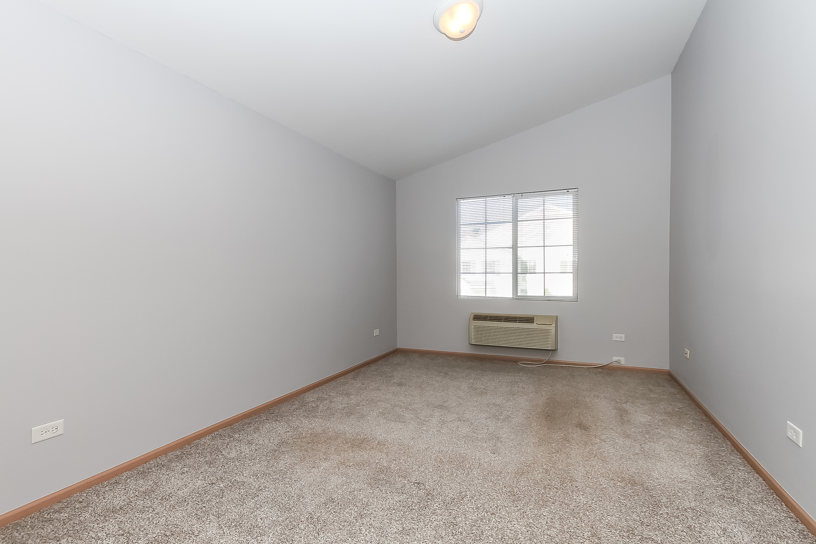 1640 McClure Road, Unit 1640 Aurora, IL 60505 - Photo 14 of 25 an empty room with windows