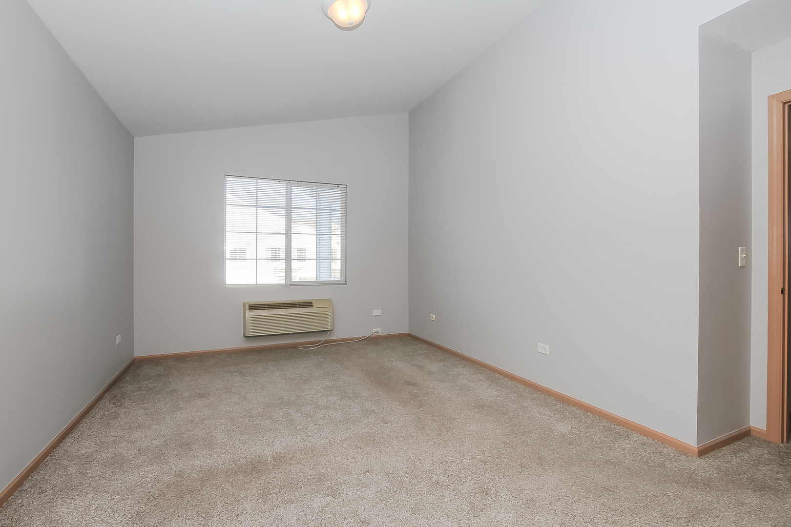 1640 McClure Road, Unit 1640 Aurora, IL 60505 - Photo 15 of 25 an empty room with a window