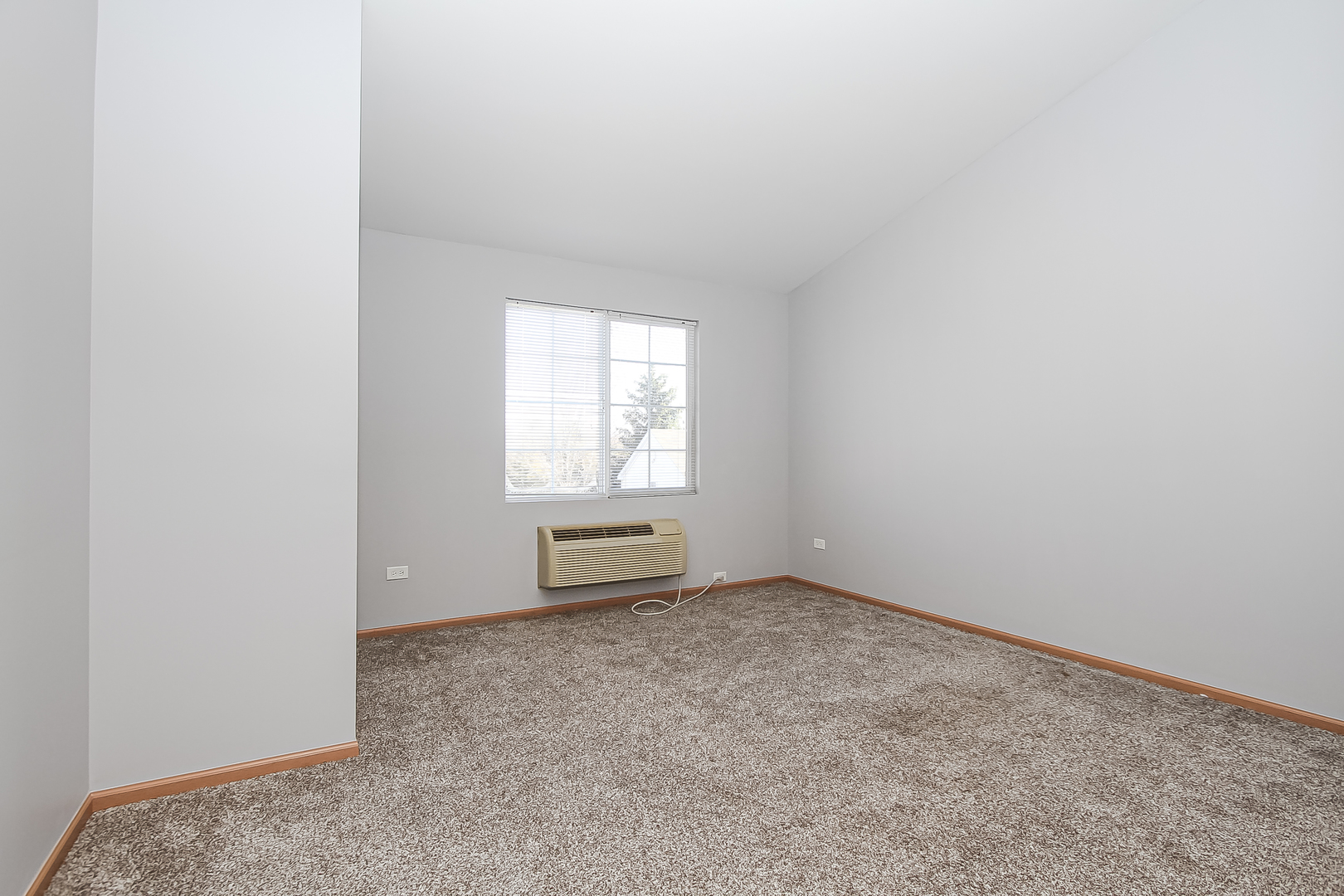 1640 McClure Road, Unit 1640 Aurora, IL 60505 - Photo 20 of 25 an empty room with a window