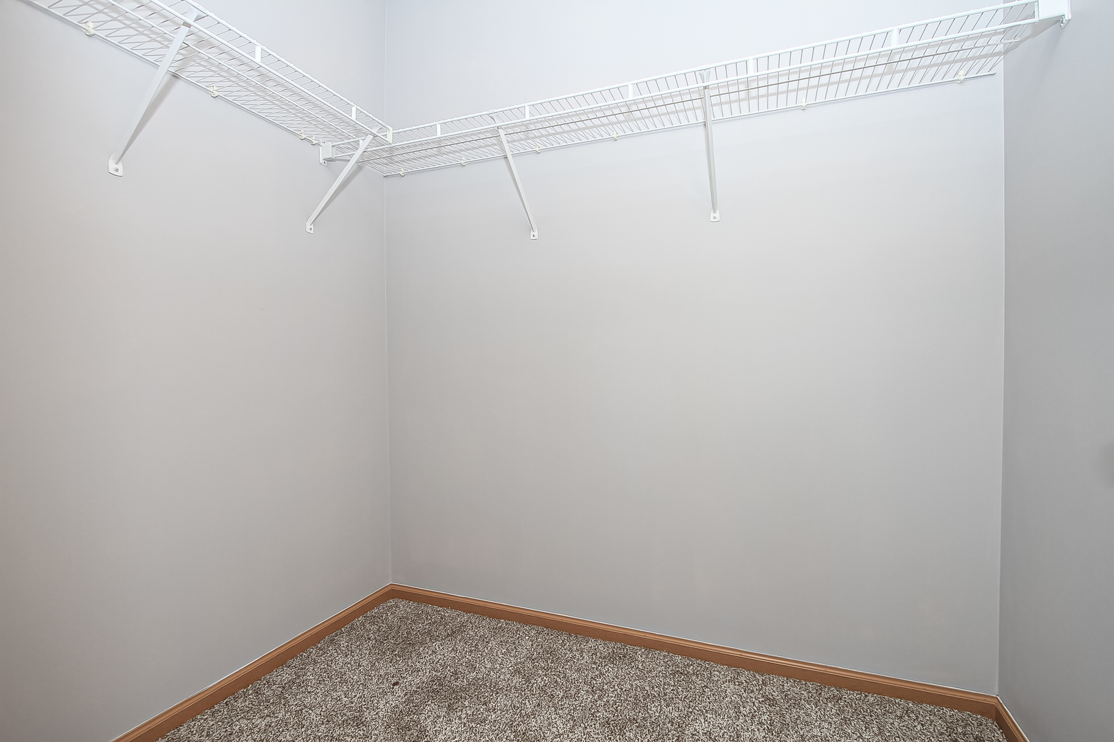 1640 McClure Road, Unit 1640 Aurora, IL 60505 - Photo 22 of 25 a view of a room with racks on the wall