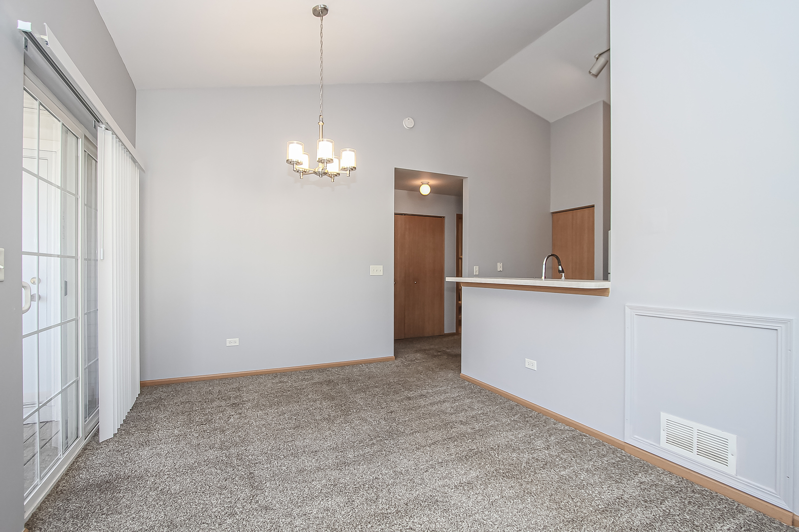 1640 McClure Road, Unit 1640 Aurora, IL 60505 - Photo 7 of 25 wooden floor in an empty room with a window