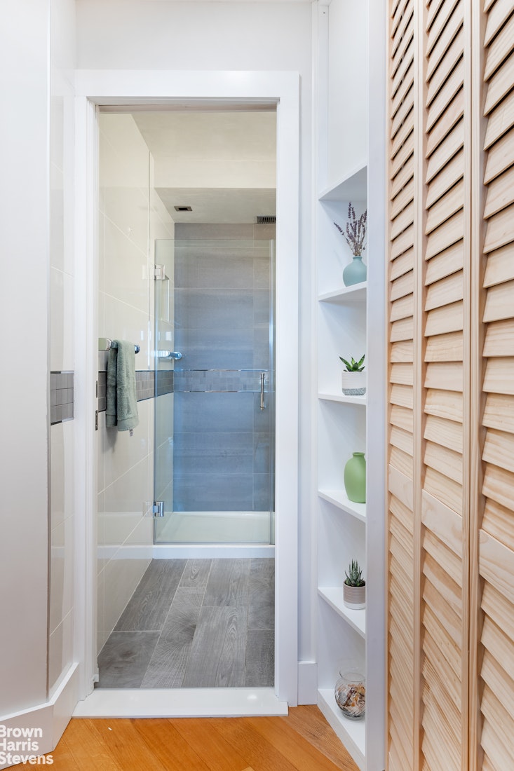 5700 Arlington Avenue, Unit 21R Bronx, NY 10471 - Photo 11 of 23 a bathroom with a shower