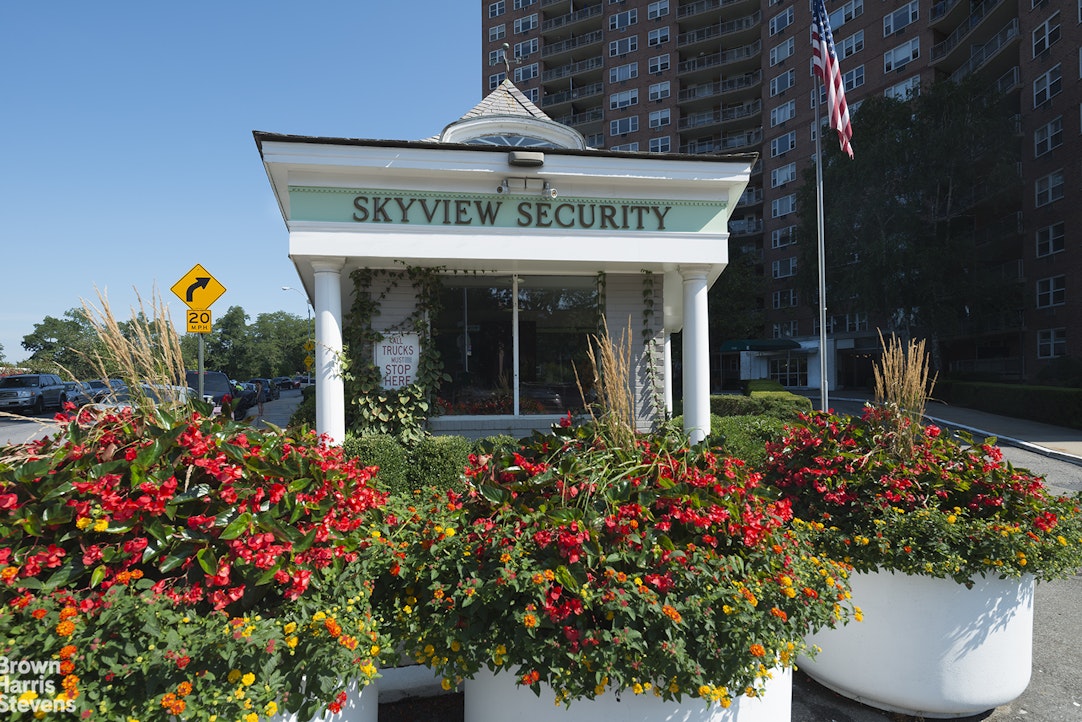 5700 Arlington Avenue, Unit 21R Bronx, NY 10471 - Photo 18 of 23 a front view of house and flowers