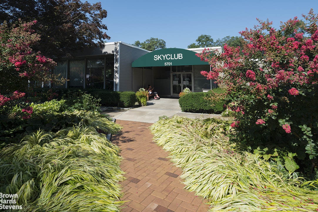 5700 Arlington Avenue, Unit 21R Bronx, NY 10471 - Photo 19 of 23 a view of a house with a garden and pathway