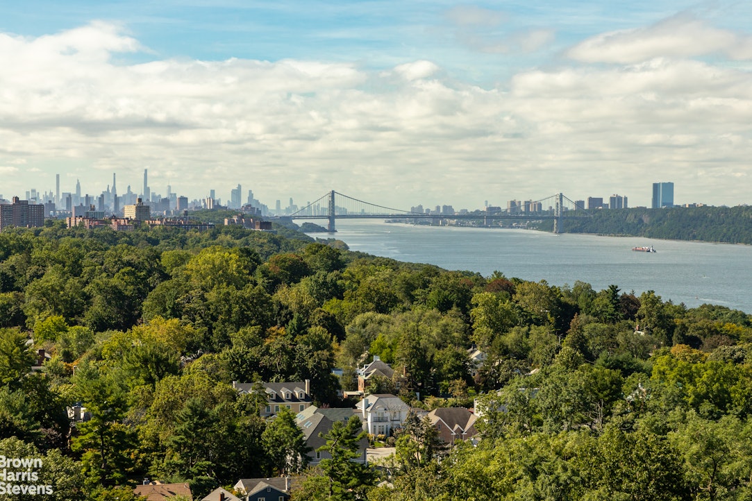 5700 Arlington Avenue, Unit 21R Bronx, NY 10471 - Photo 9 of 23 a view of an ocean with a city