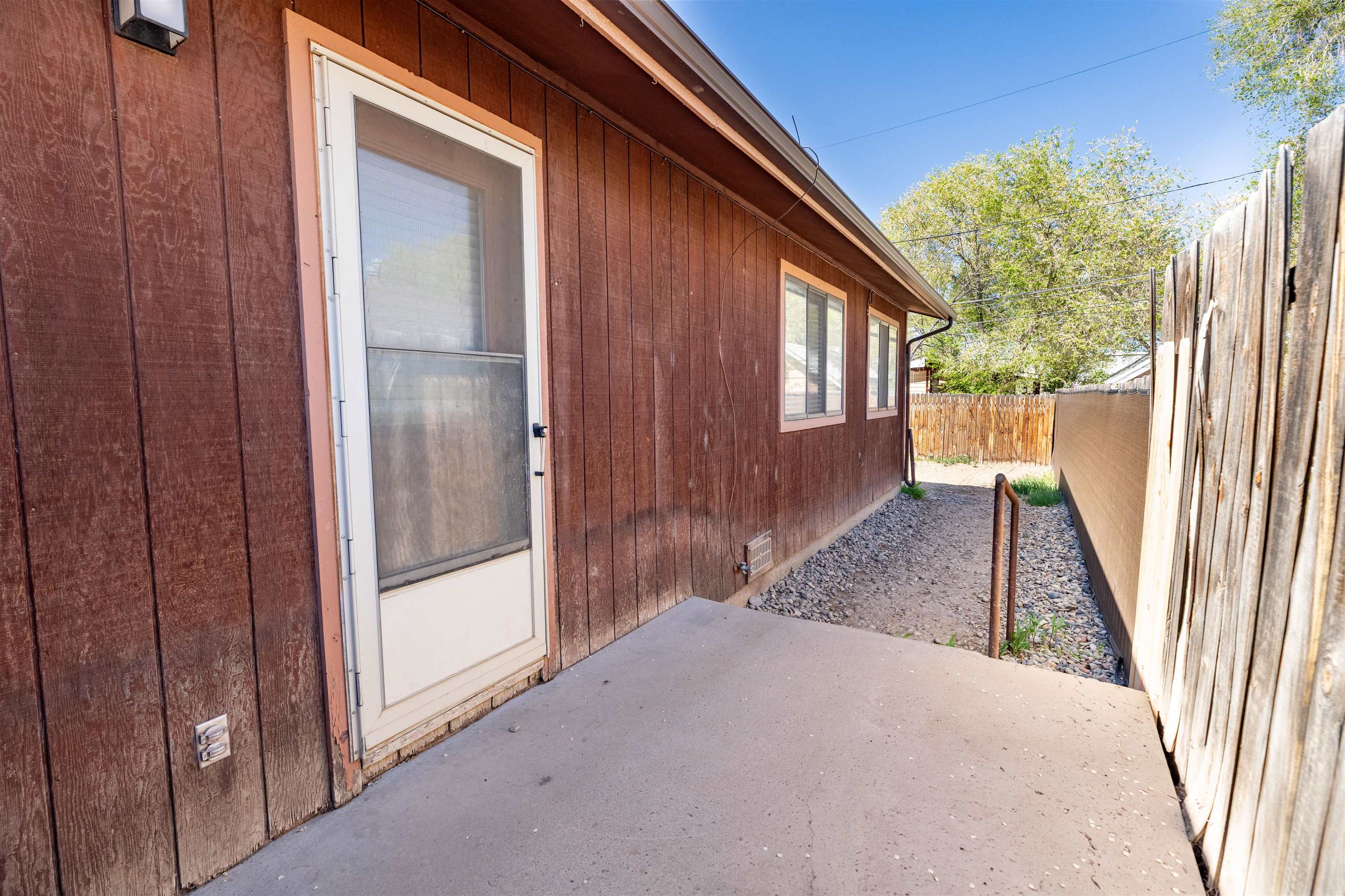 239 South Elm Street, Unit A Fruita, CO 81521 - Photo 18 of 22 a view of a house with a backyard
