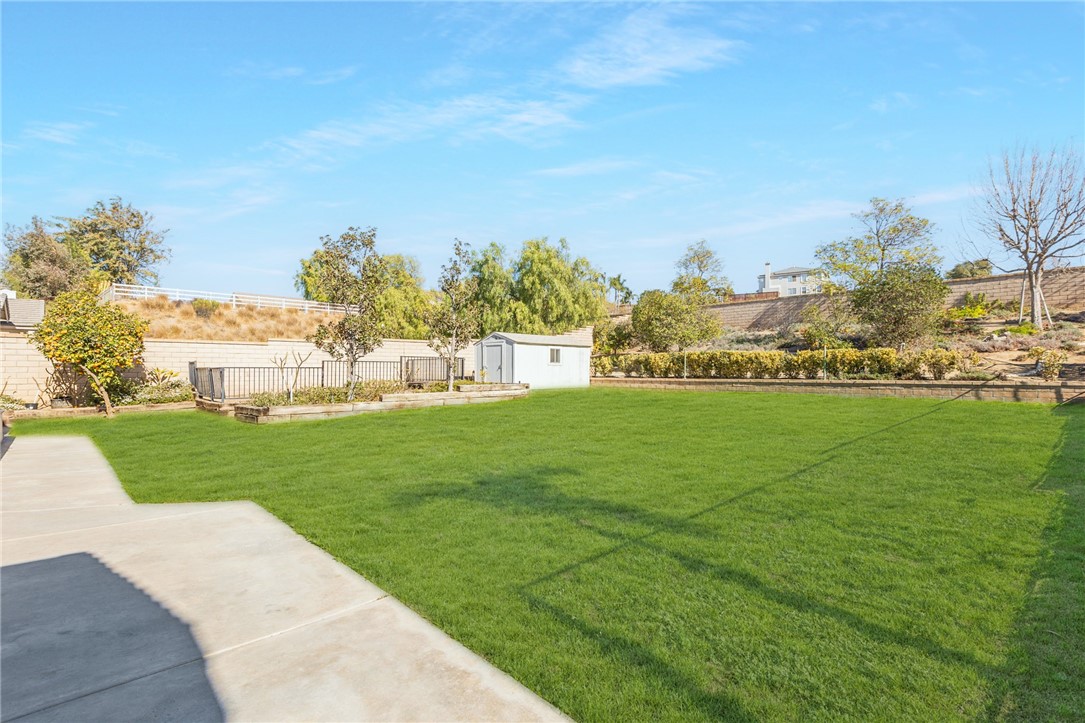 3047 Dapplegray Lane Norco, CA 92860 - Photo 23 of 28 a view of a golf course with a garden