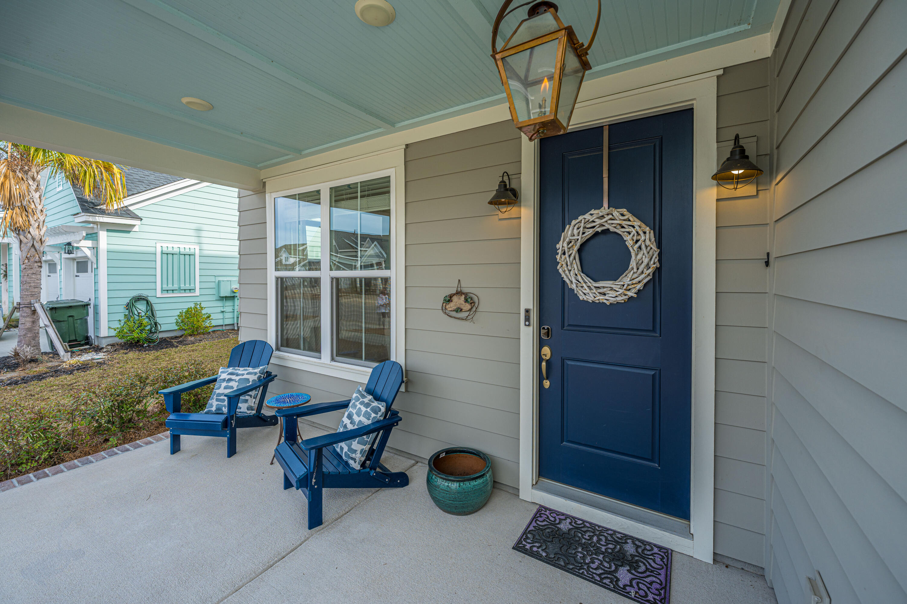168 Clearblue Loop Summerville, SC 29486 - Photo 4 of 56 Gas lantern front porch