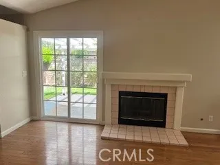 a kitchen with granite countertop white cabinets and appliances
