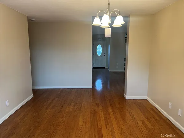 a spacious bathroom with a double vanity sink and a mirror