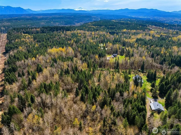 a view of mountain with sunset view
