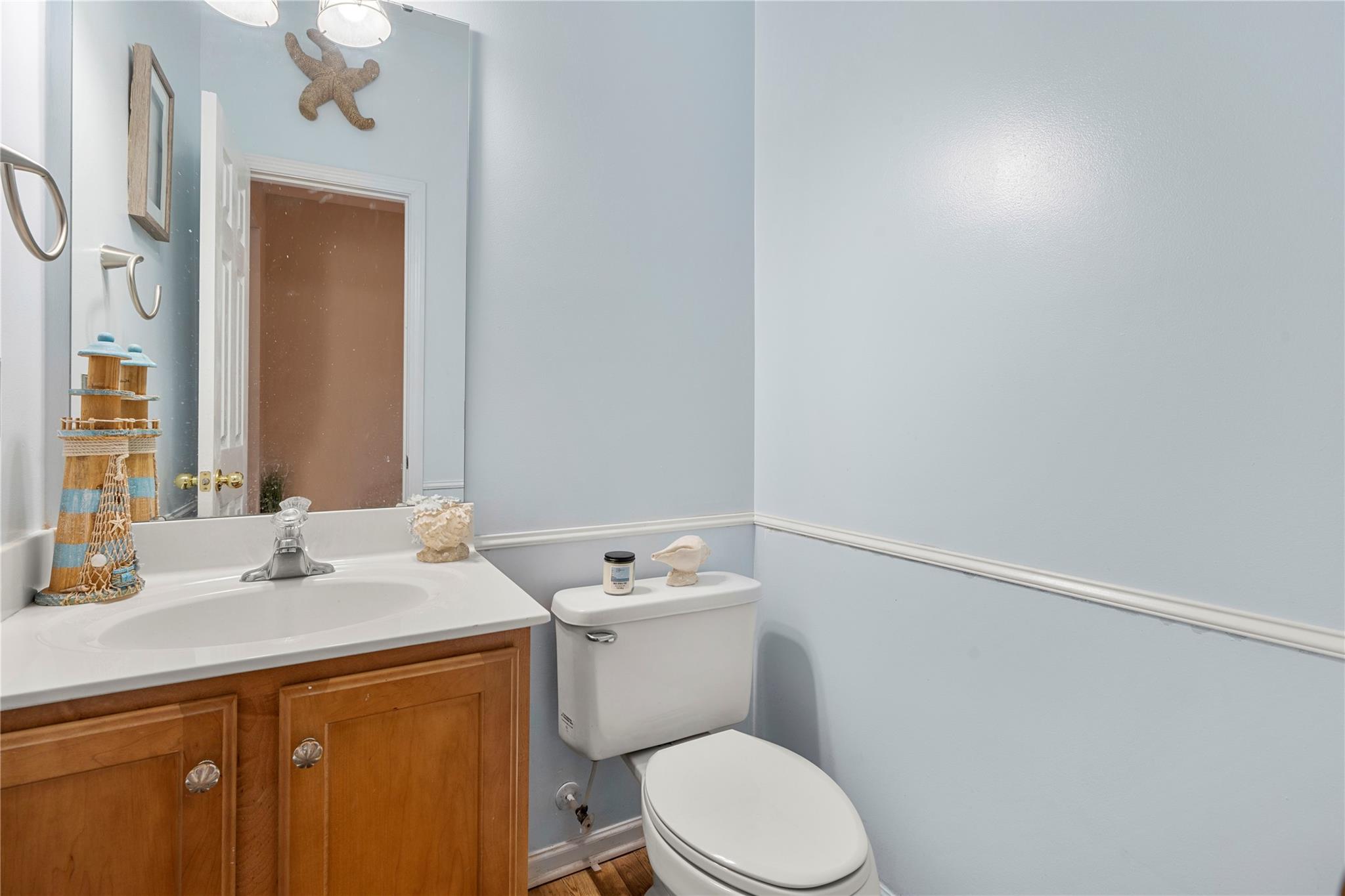 1806 Montague Road Clover, SC 29710 - Photo 11 of 39 a bathroom with a sink a toilet and mirror