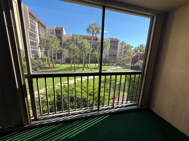 a view of a balcony with an outdoor space