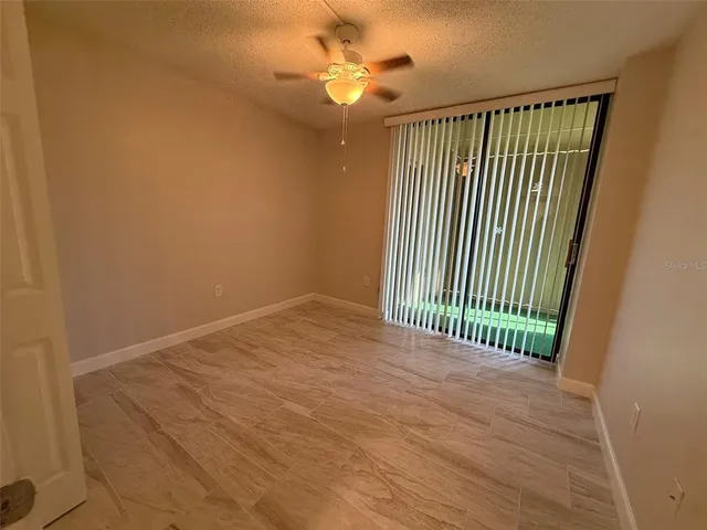 a view of empty room with a window
