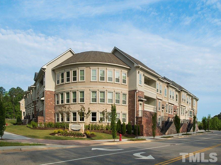 4700 Riverwood Circle, Unit 268 Raleigh, NC 27612 - Photo 22 of 22 a front view of a building with a street