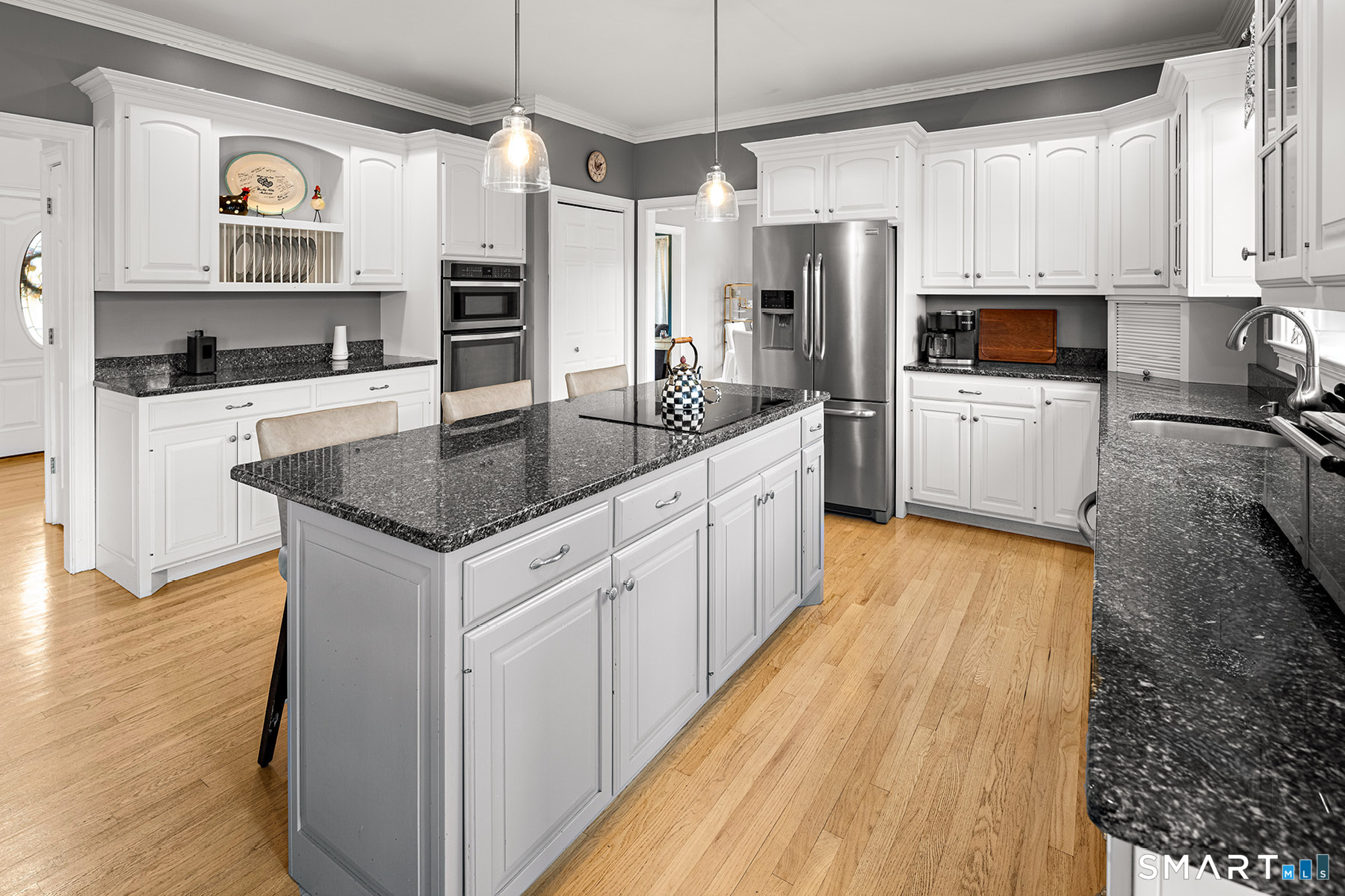 16 Marie Lane Wallingford, CT 06492 - Photo 12 of 40 a kitchen with stainless steel appliances granite countertop a refrigerator a stove and a sink