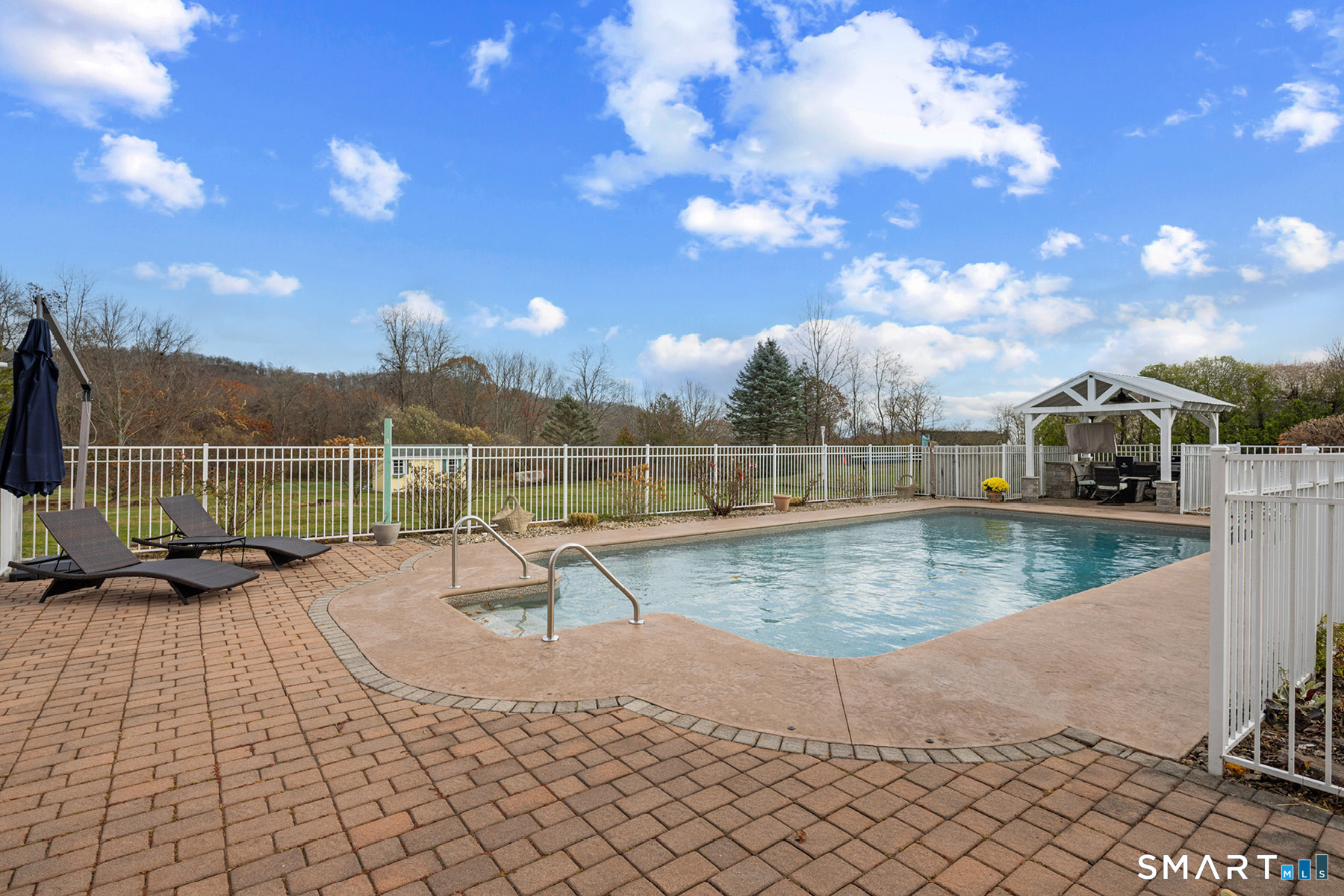 16 Marie Lane Wallingford, CT 06492 - Photo 16 of 40 a view of a swimming pool with a lounge chairs