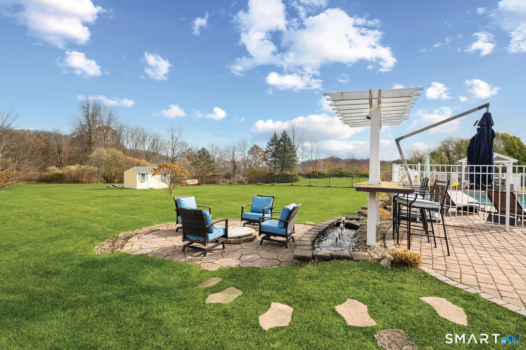 16 Marie Lane Wallingford, CT 06492 - Photo 18 of 40 a view of a garden with lawn chairs