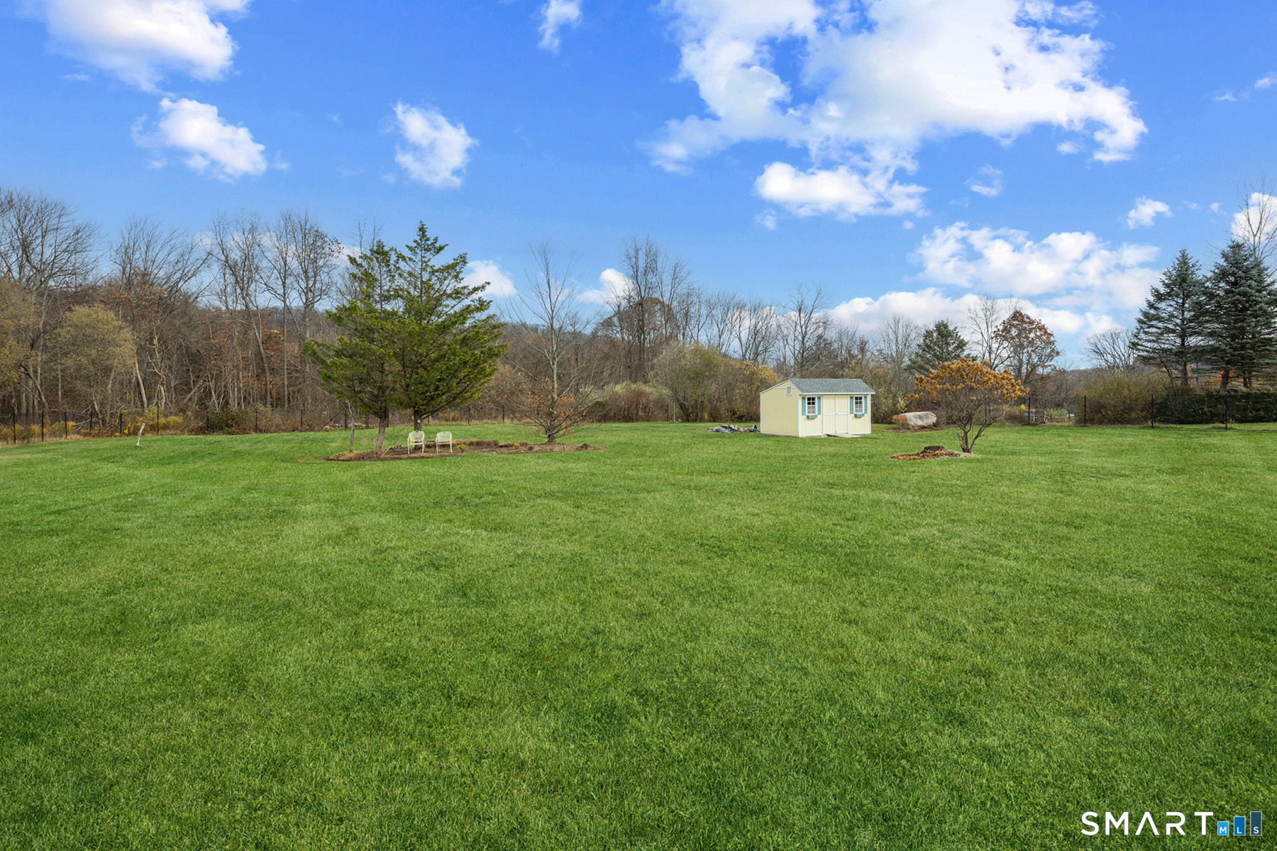 16 Marie Lane Wallingford, CT 06492 - Photo 20 of 40 a view of a golf course with a lake