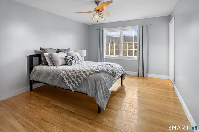 a view of a livingroom with furniture staircase