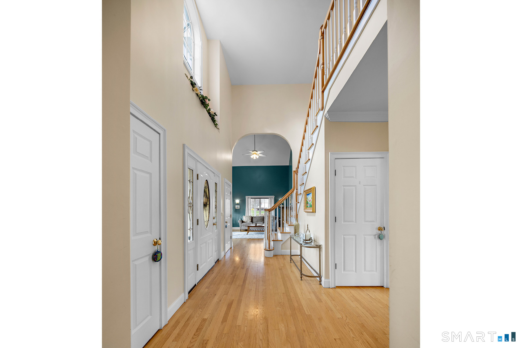 16 Marie Lane Wallingford, CT 06492 - Photo 7 of 40 a view of a hallway with wooden floor