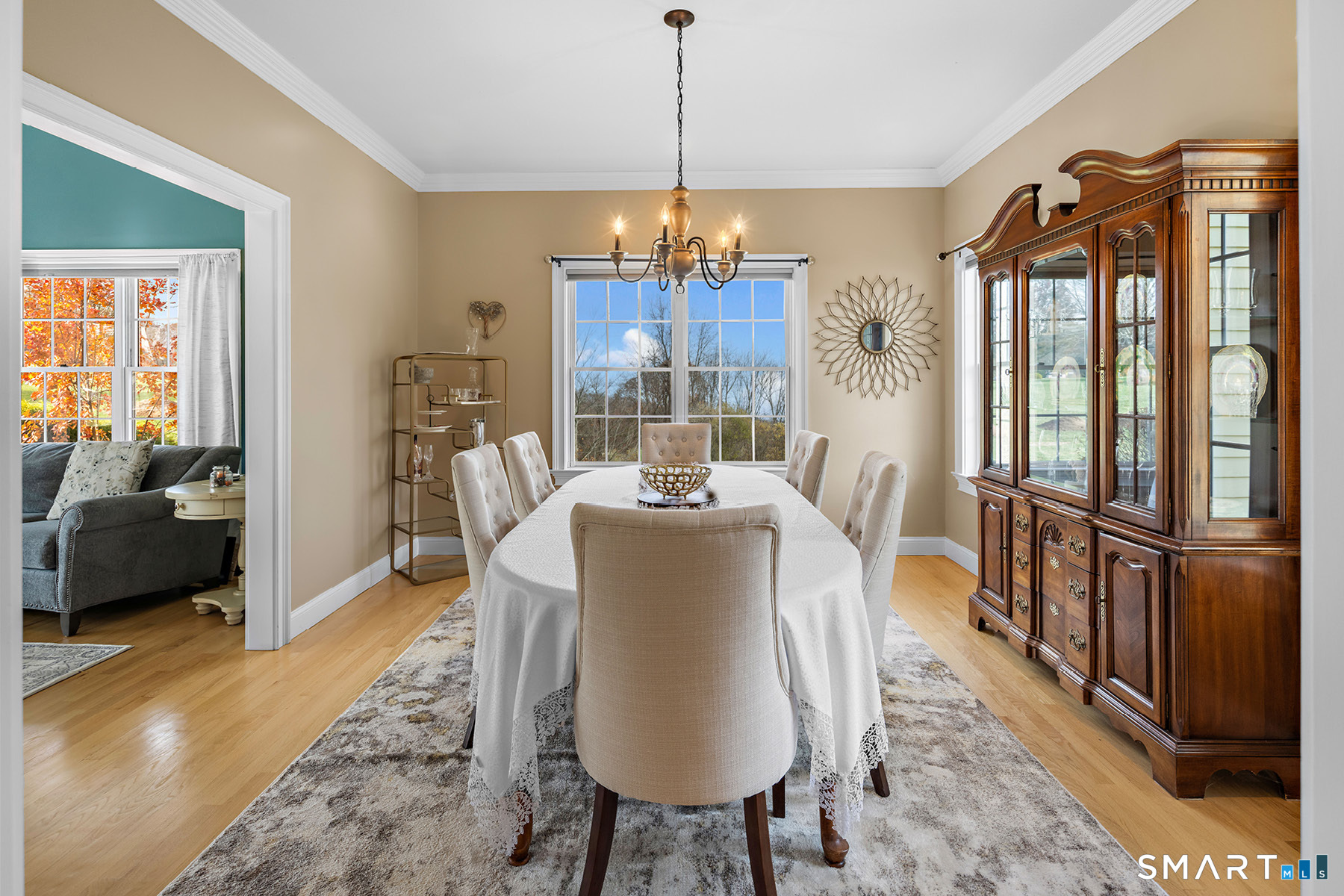 16 Marie Lane Wallingford, CT 06492 - Photo 10 of 40 a dining room with furniture a chandelier and wooden floor