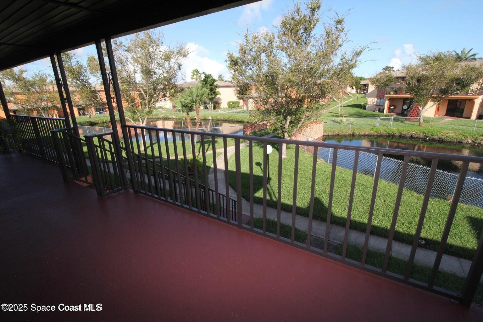 217 San Juan Circle Melbourne, FL 32935 - Photo 8 of 9 a balcony with street view