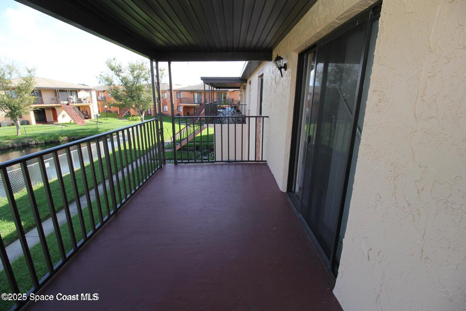217 San Juan Circle Melbourne, FL 32935 - Photo 9 of 9 a view of a porch