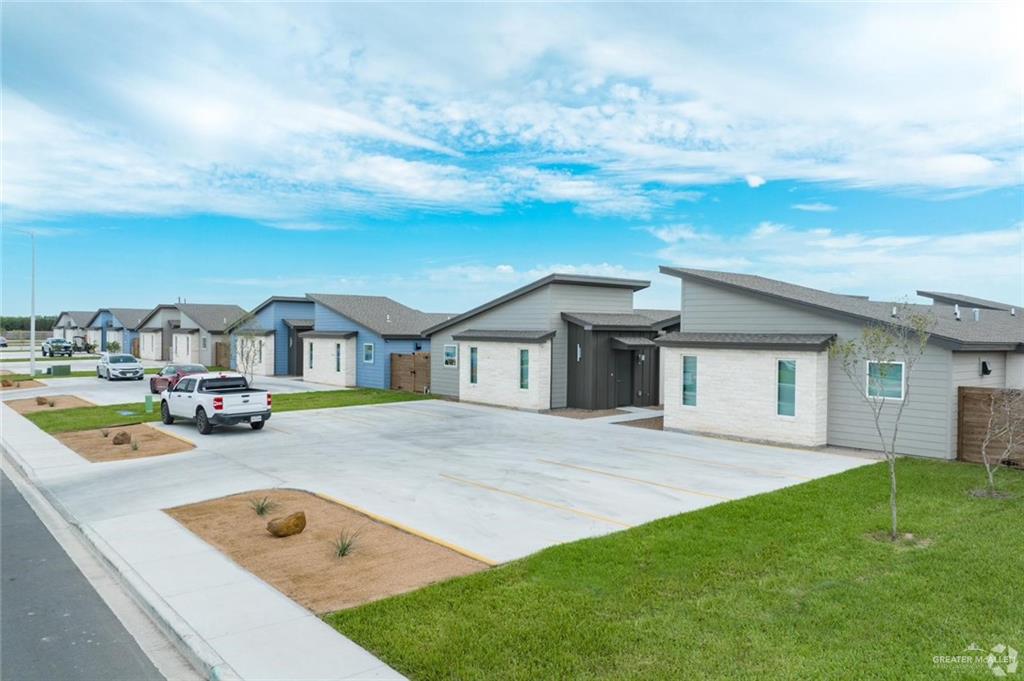4004 Jenna Lane, Unit A Weslaco, TX 78599 - Photo 4 of 29 a house view with a garden space