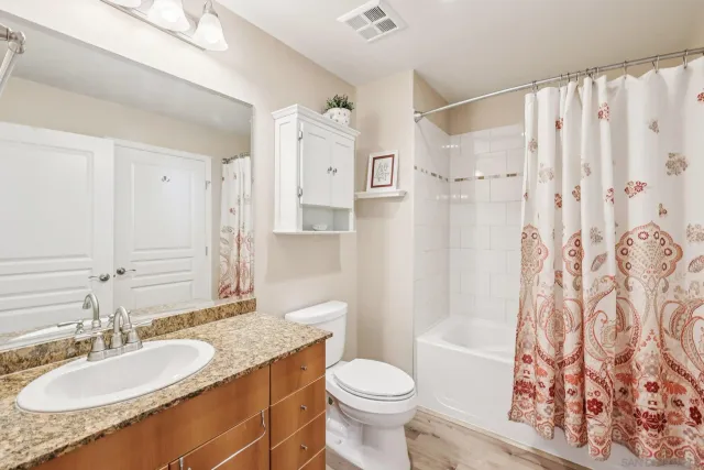 a view of a balcony with chairs