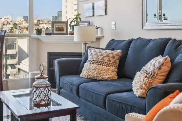 a kitchen with stainless steel appliances granite countertop a stove top oven a sink and a refrigerator