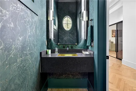 a kitchen with stainless steel appliances a stove and a refrigerator