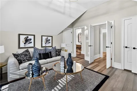 a room with dining table and chairs