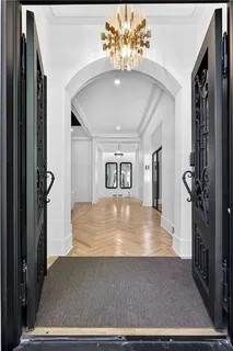 a view of livingroom with hardwood floor and hallway